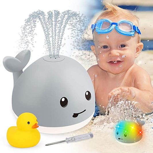 Cute Baby Whale Floating Spraying Water